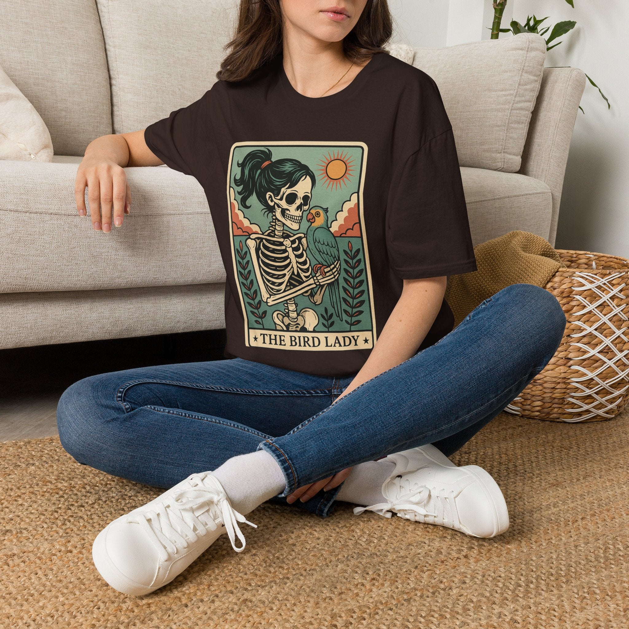 The Bird Lady T-Shirt — Retro Skeleton Woman with Parrot Graphic