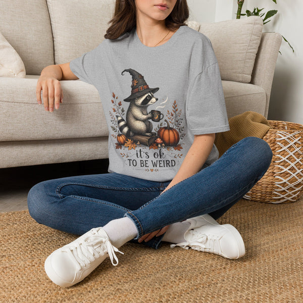 T-Shirt — Cute Raccoon Witch Illustration "It's OK to Be Weird" | Halloween Cozy Fall Graphic Tee
