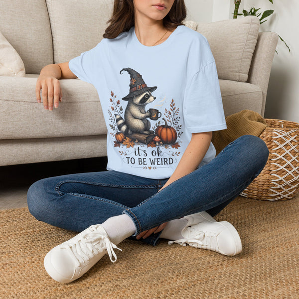 T-Shirt — Cute Raccoon Witch Illustration "It's OK to Be Weird" | Halloween Cozy Fall Graphic Tee