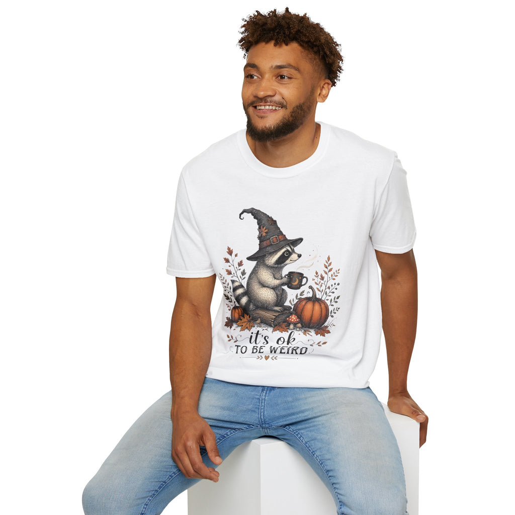 T-Shirt — Cute Raccoon Witch Illustration "It's OK to Be Weird" | Halloween Cozy Fall Graphic Tee