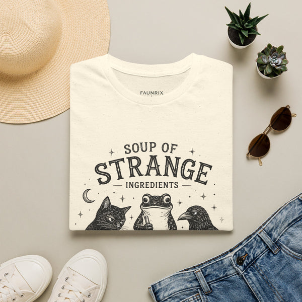 T-Shirt — "Soup of Strange Ingredients" Witchy Frog, Cat & Crow Illustration