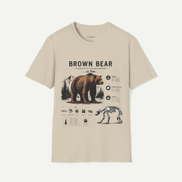 A beige short-sleeve crewneck t-shirt featuring a detailed graphic print of a brown bear, a skeleton bear, and forest details with the text 'BROWN BEAR' and 'STRENGTH OF THE WILDERNESS'.