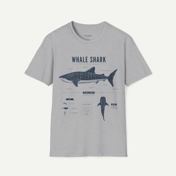 A light gray heather crewneck t-shirt featuring a dark blue-gray graphic print of a whale shark with educational text and diagrams, displayed on a clean off-white background.