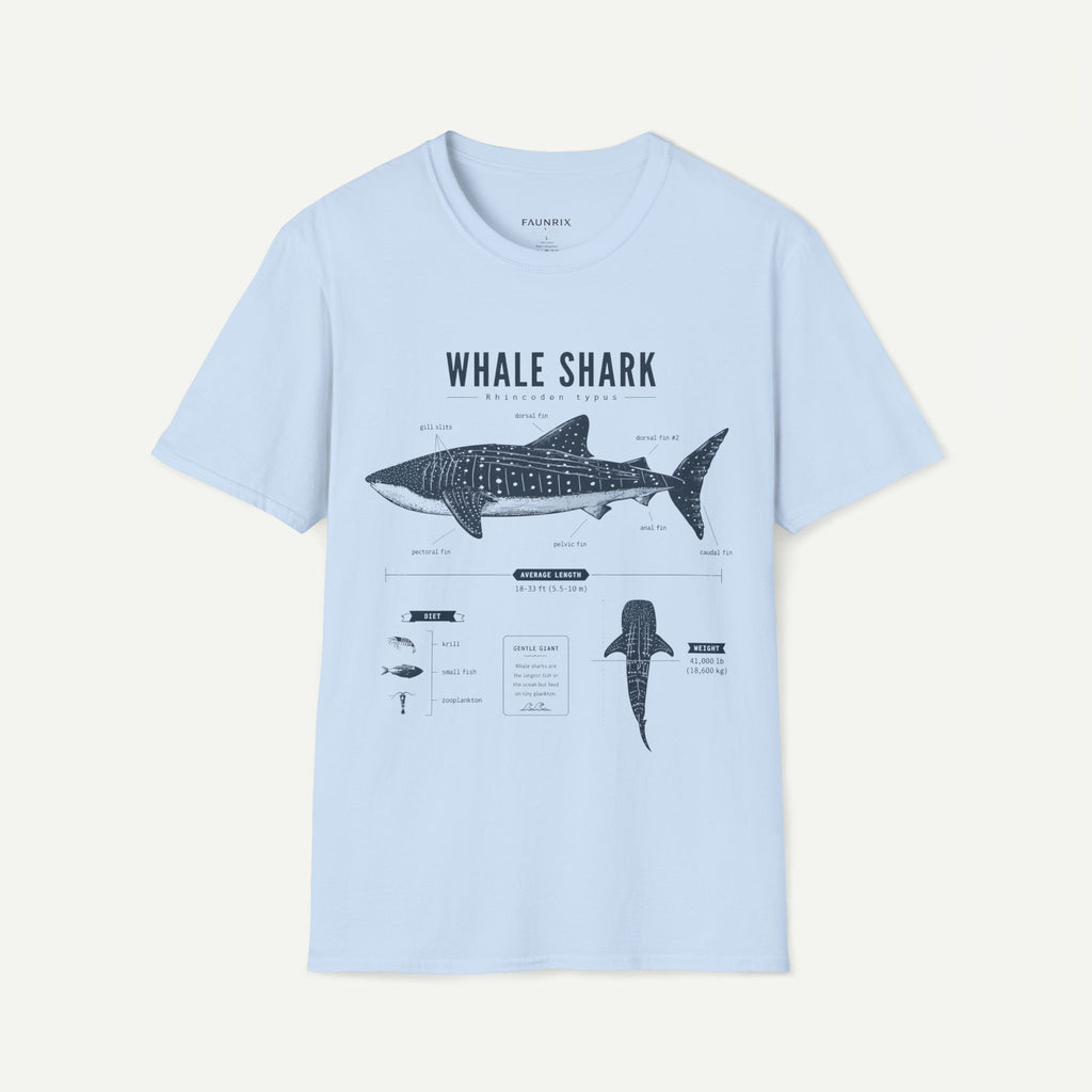 A light blue short-sleeve crewneck t-shirt featuring a detailed black and white whale shark diagram graphic on the front, displayed against a solid off-white background.