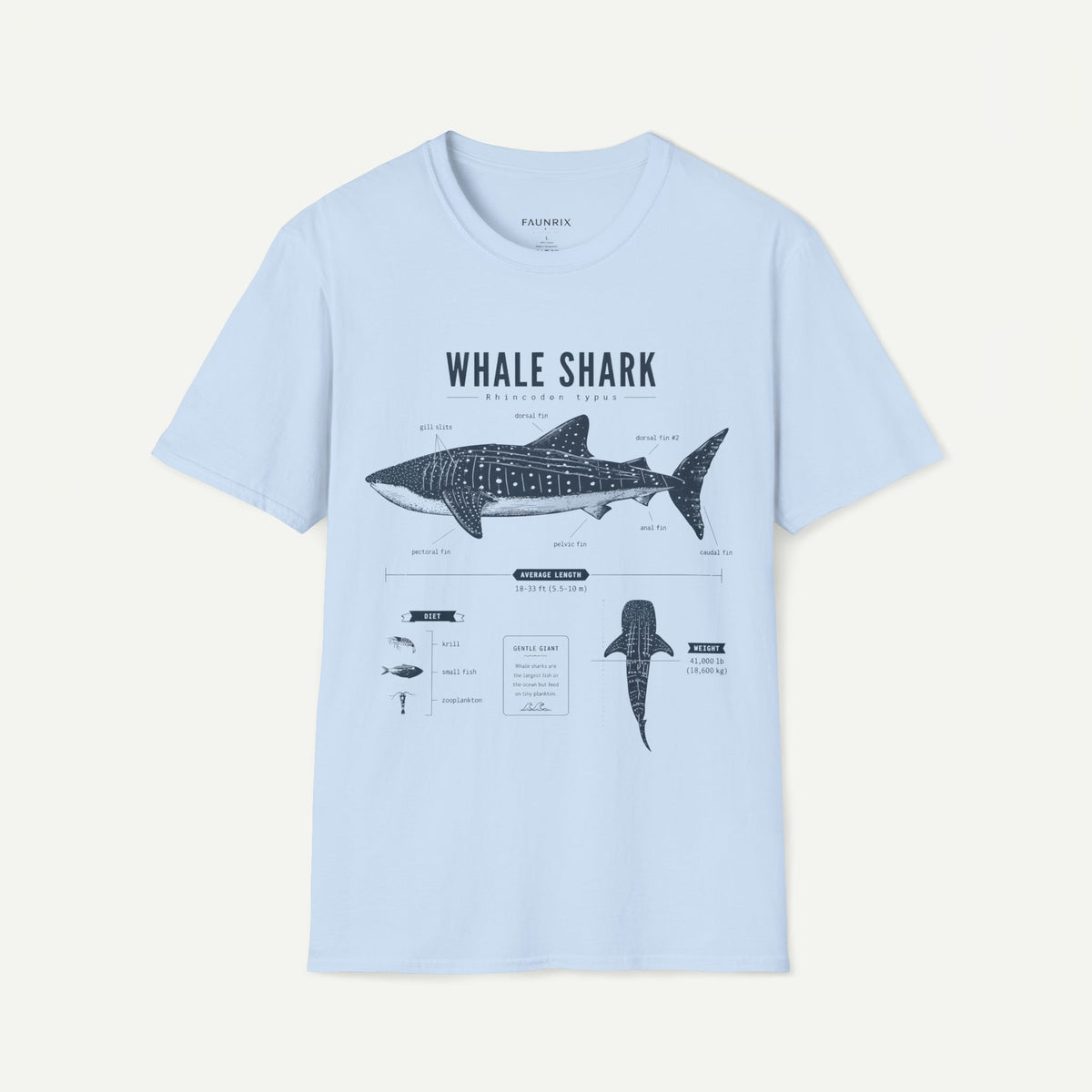 A light blue short-sleeve crewneck t-shirt featuring a detailed black and white whale shark diagram graphic on the front, displayed against a solid off-white background.